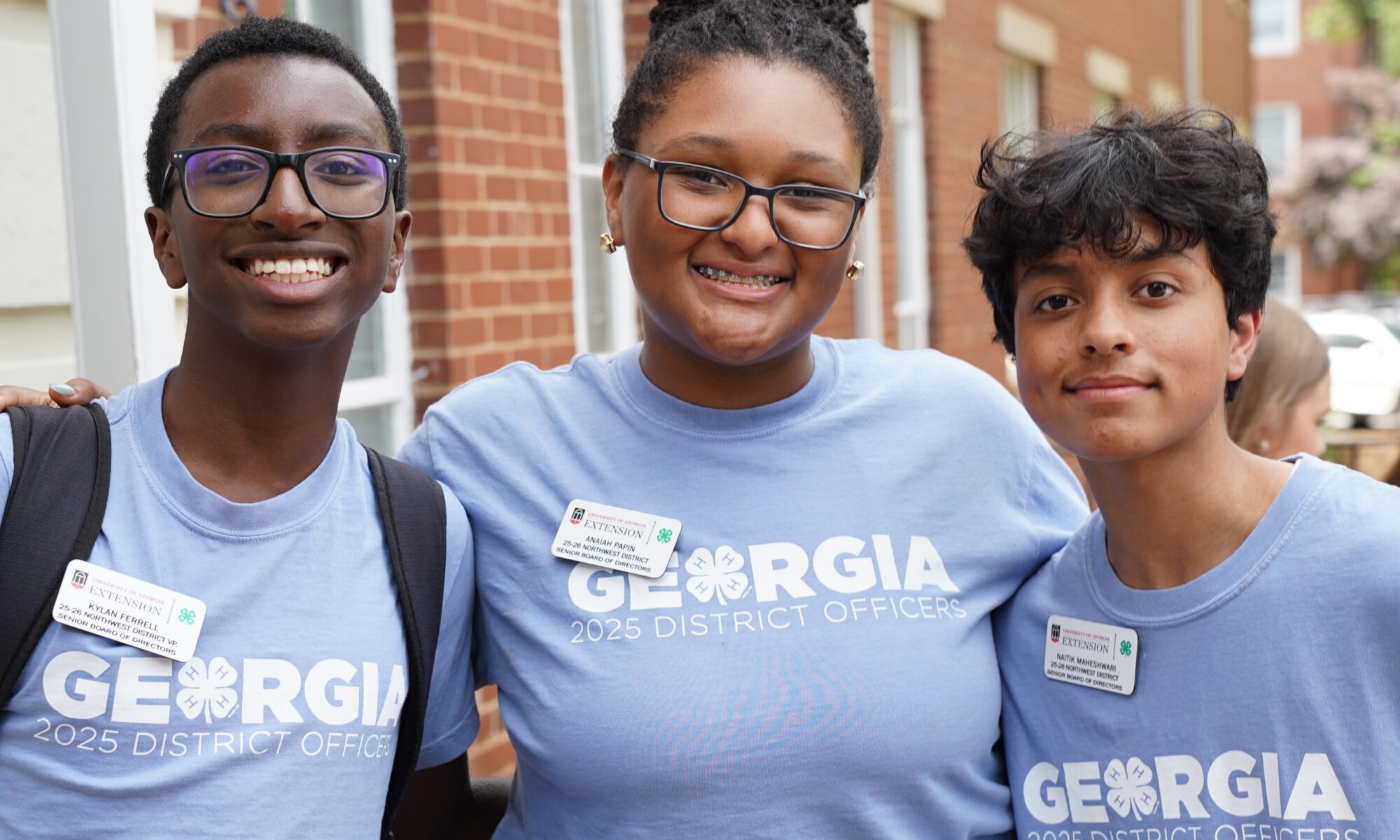 Three 4-H youth posed for a photo together.